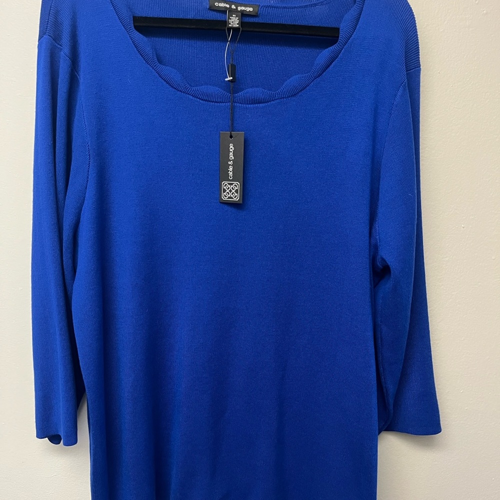 NWT Gorgeous woman’s sweater.